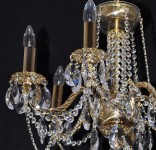 Detail of the 6 Arms Crystal cast brass chandelier with glossy twisted arms