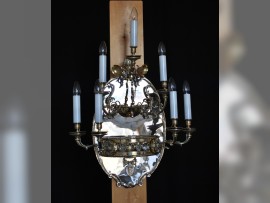 7-armige Jagdwandleuchte mit einem Metallspiegel