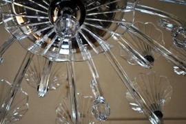 Detail of silver chandelier and cut glass