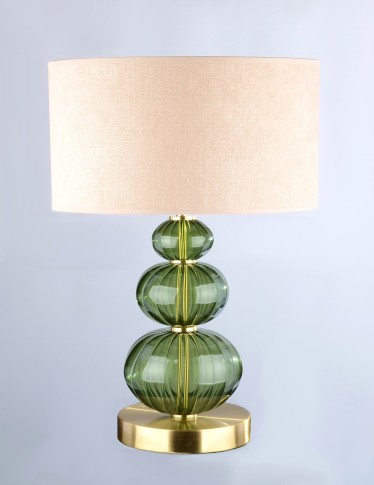 Eine diskrete Tischlampe aus dunkelgrünem Glas in der Farbe eines gefallenen Sterns (Moldavit).